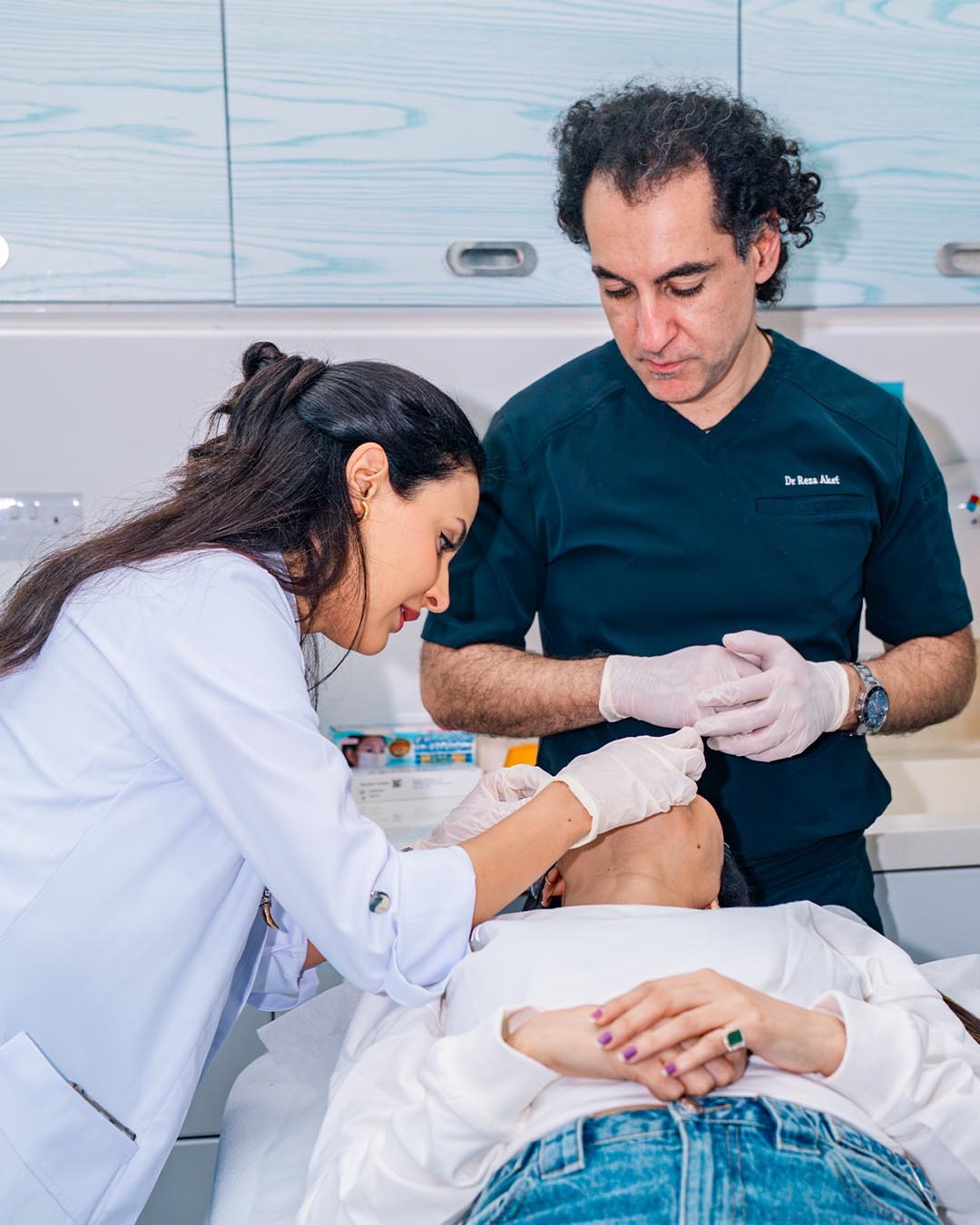 A practitioner treating a patient in a CBAM clinic